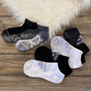NEW LIST!  6 PR. OF ATHLETIC SOCKS. 4 ADIDAS & 2 UNKNOWN WITH GRIPPER BOTTOMS.